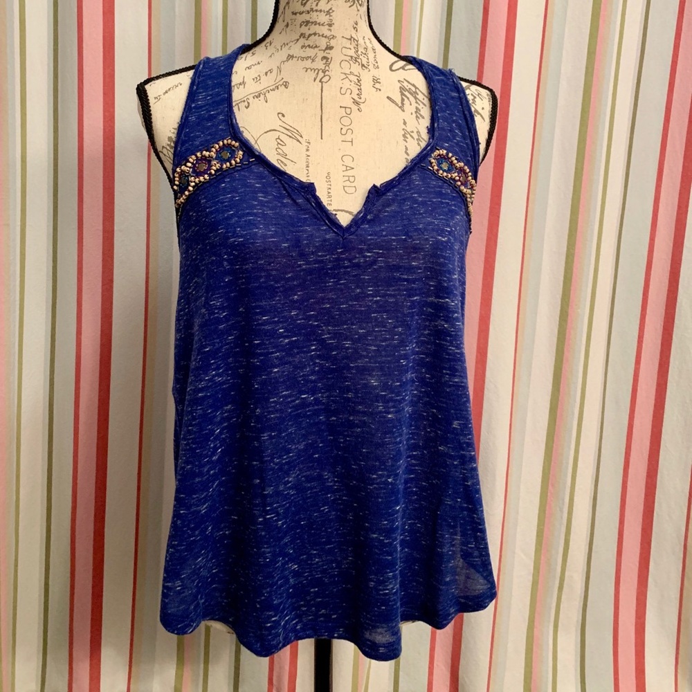 Blue eyeshadow high-low tank